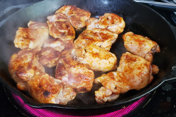View of chicken thighs cooking