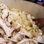 Picture of chicken being mixed with rice