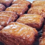 Iced donuts on cooling rack